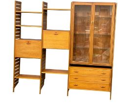A 1960’s Mid Century teak Ladderax designed by Robert Heal for Staples. Including a fall down
