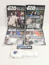 A collection of DeAgostini Star Wars issues, Build Your Own R2-D2. Issues 19-22.