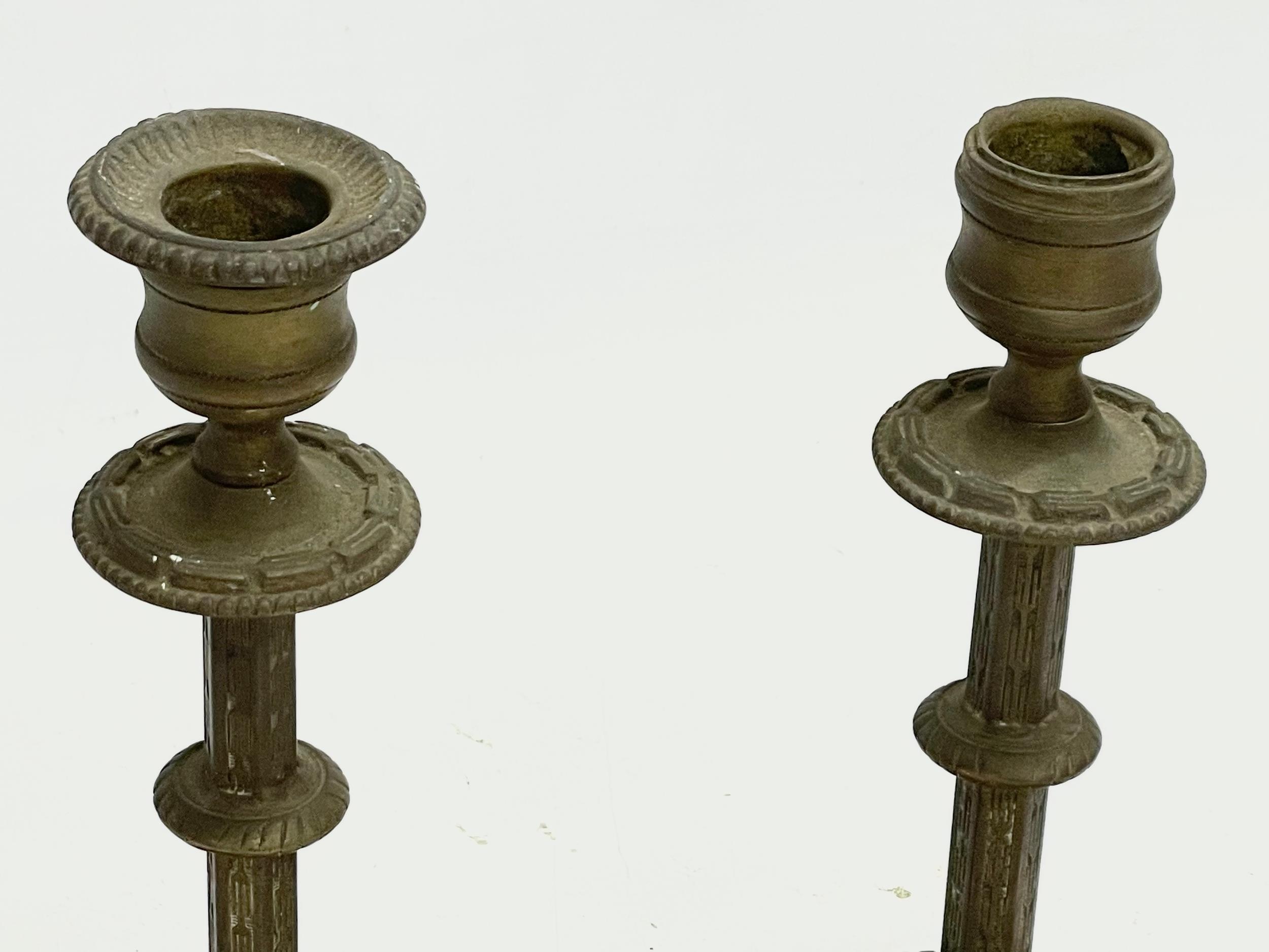 A 19th century spelter bust on stand with a pair of late 19th century brass candlesticks. Bust - Image 4 of 6