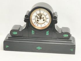 A large Victorian slate mantle clock by C.J & Co. French movement. With key and pendulum.