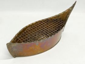 An early 20th century copper boat shaped flower holder/planter. 41x13x14cm