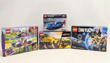 4 boxes of unopened Lego, including Dimensions Starter Pack, Speed Champions Chevrolet car model,