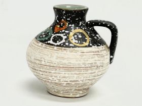 A Carstens Tönnieshof West German drip glazed pottery vase. 11x10cm