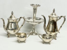 A 4 piece silver plated tea service and a silver plated epergne centrepiece. Epergne measures 20.