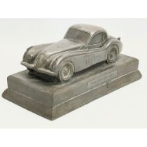 A Jaguar XK 150 ornament