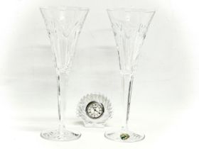 A pair of large Waterford ‘Love’ champagne glasses and a small Waterford clock. 23.5cm