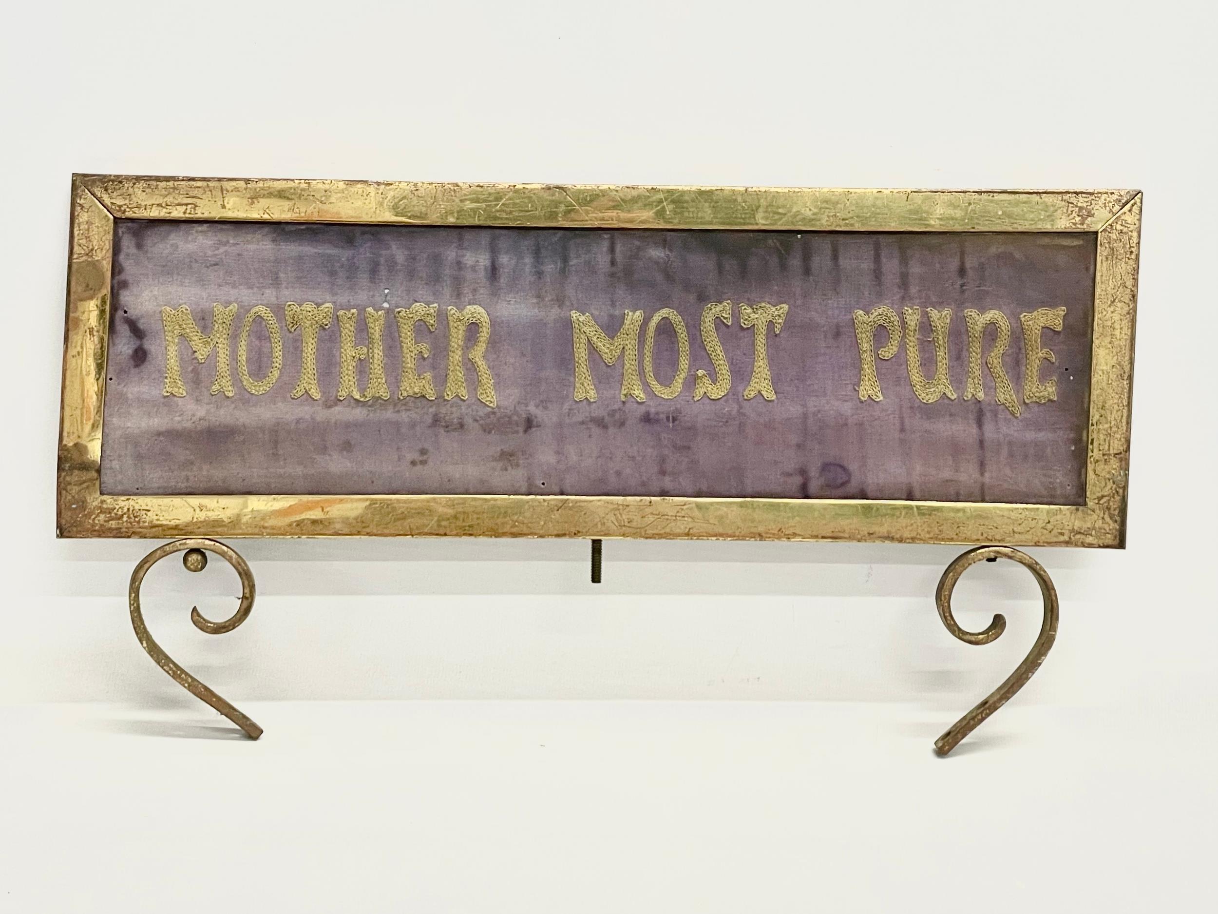 An early 20th century double sided brass framed religious embroidery. Mother Most Pure. 41.5x22cm.