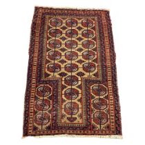 A vintage Middle Eastern hand knotted rug. 87.5x139cm