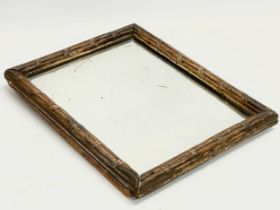 A 19th century gilt faux bamboo framed mirror. 28x35cm