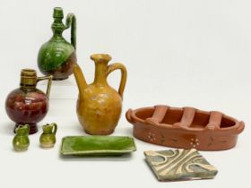 A collection of vintage glazed stoneware pottery.