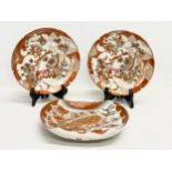 Saik Kutani. A late 19th century Japanese Meiji Period rolled edge porcelain dish with a pair of