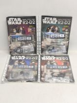 A collection of DeAgostini Star Wars issues, Build Your Own R2-D2. Issues 7-10.