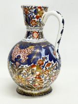 A vintage ‘Imari’ pattern jug. With makers stamp. 15x22cm