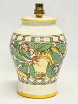 A large Charlotte Rhead style pottery table lamp. 28cm
