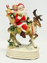 A large pottery musical Santa Claus designed by Matt Hromalik for Otagiri, Japan. Santa Claus is