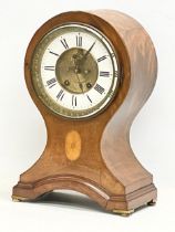 A large Edwardian inlaid mahogany balloon clock. With key and pendulum. 28x19x44cm