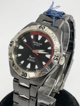 An Omax Crystal 50 Meters Waterproof watch.