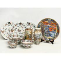 A collection of Chinese and Japanese pottery. Japanese charger 30.5cm. Vases 21cm. 3 Chinese