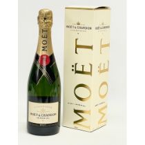 A bottle of Moët & Chandon Imperial Brut champagne in box. 150th Anniversary. 750ml.