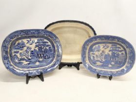 A set of 3 mid to late 19th century pottery platters. Largest measures 43.5x35.5cm