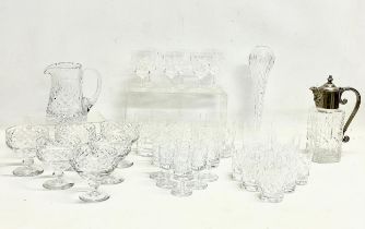 6 crystal drinking sets, crystal water jug and a silver plated claret jug. Set of 5 Whiskey glasses,