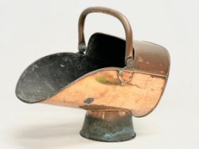 A Victorian copper coal scuttle. 47x25x40 including handle.