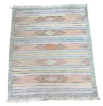 A vintage rug. 190x132cm