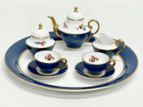 A miniature tea set by Caverswall. Tray measures 18.5cm