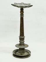 A late 19th/early 20th century Indian bronze Diya lamp stand. 42cm.