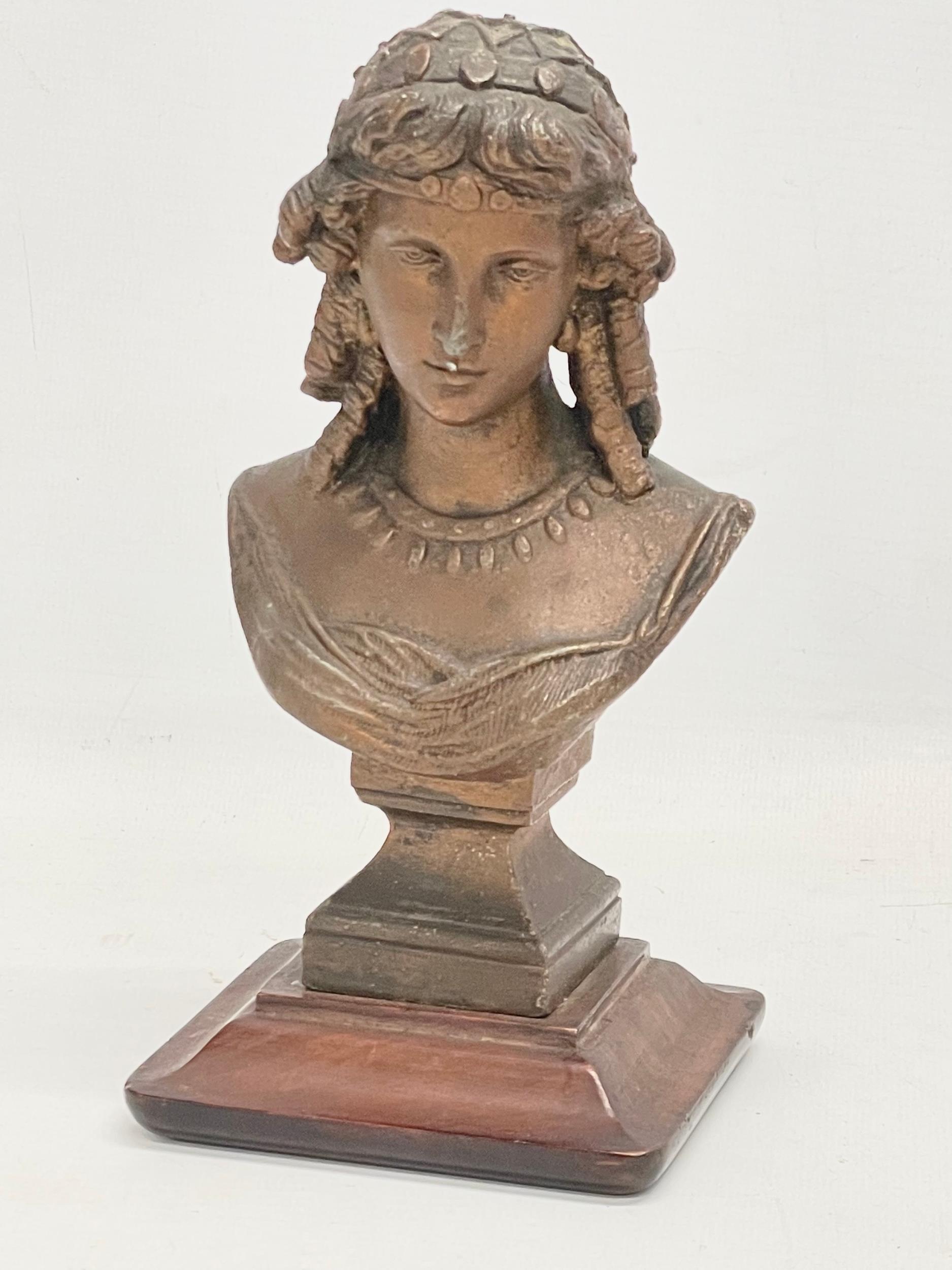 A 19th century spelter bust on stand with a pair of late 19th century brass candlesticks. Bust - Image 5 of 6
