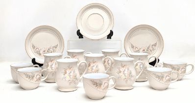 A 19 piece Denby 'Tivoli' tea and coffee set.