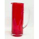 A large Mid Century Swedish style glass pitcher in the manner of Monica Bratt. 27cm