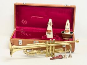 A brass trumpet in case. Case measures 53x25x13cm