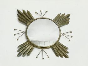 A 1960’s Mid Century brass framed sunburst convex mirror. 55cm