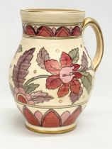 An early 20th century Charlotte Rhead vase. Designed for Crown Ducal. 23x26cm