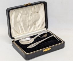 A silver baby spoon with silver food pusher. Birmingham, 1936. Arthur Price & Co Ltd. 38.8g