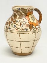 A 1930’s Charlotte Rhead ‘Trellis’ jug. Designed for Bursley Ware. 20x22cm