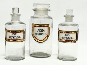 3 late 19th/early 20th century chemist bottles. 21.5cm