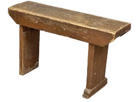 An early 20th century pine joiners stool. 85x26x51cm.