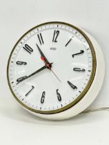 A vintage Metamec school clock. 23cm