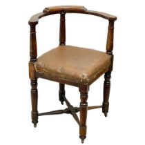 A tall late Victorian mahogany corner chair.