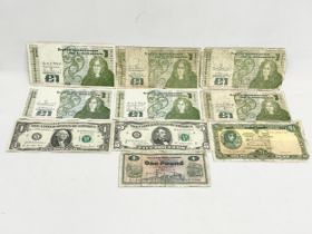 A collection of Irish, Northern Irish and American bank notes.