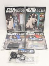 A collection of DeAgostini Star Wars issues, Build Your Own R2-D2. Issues 11-14.