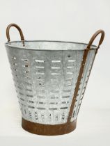 A vintage French galvanised olive basket. 45x40x45cm