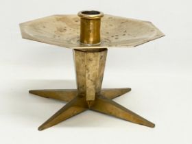 A large Art Deco bronze early 20th century candleholder. Stamped MHG. 24x24x17cm