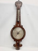 A William IV rosewood barometer with Mother of Pearl inlaid. By G. Fillinger. Circa 1830. 32.5x103.