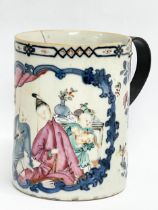 An 18 century Chinese porcelain tankard. 13.5x11.5cm