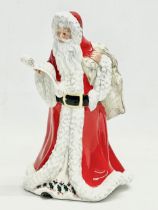 A large Royal Doulton ‘Father Christmas’ figurine. HN3399. 1992. 24cm