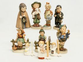 A collection of 10 Goebel pottery figures.