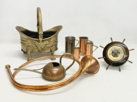 A quantity of Victorian and vintage brass and copper ware. A set of 4 copper measures. A brass